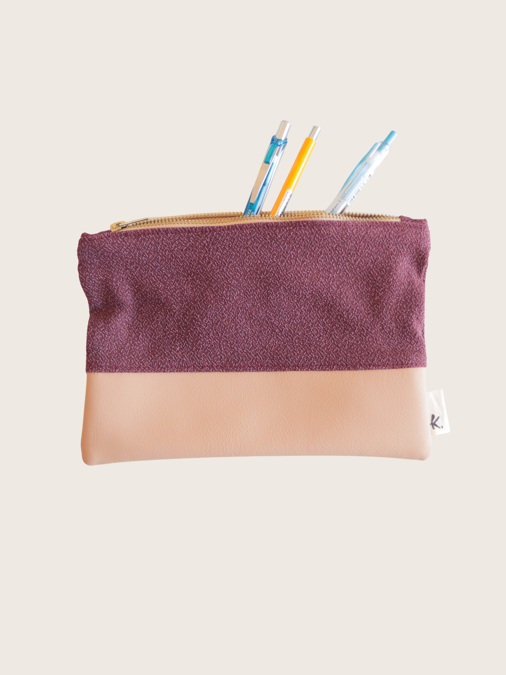 Astuccio pochette con zip in tessuto e pelle – Amaranto