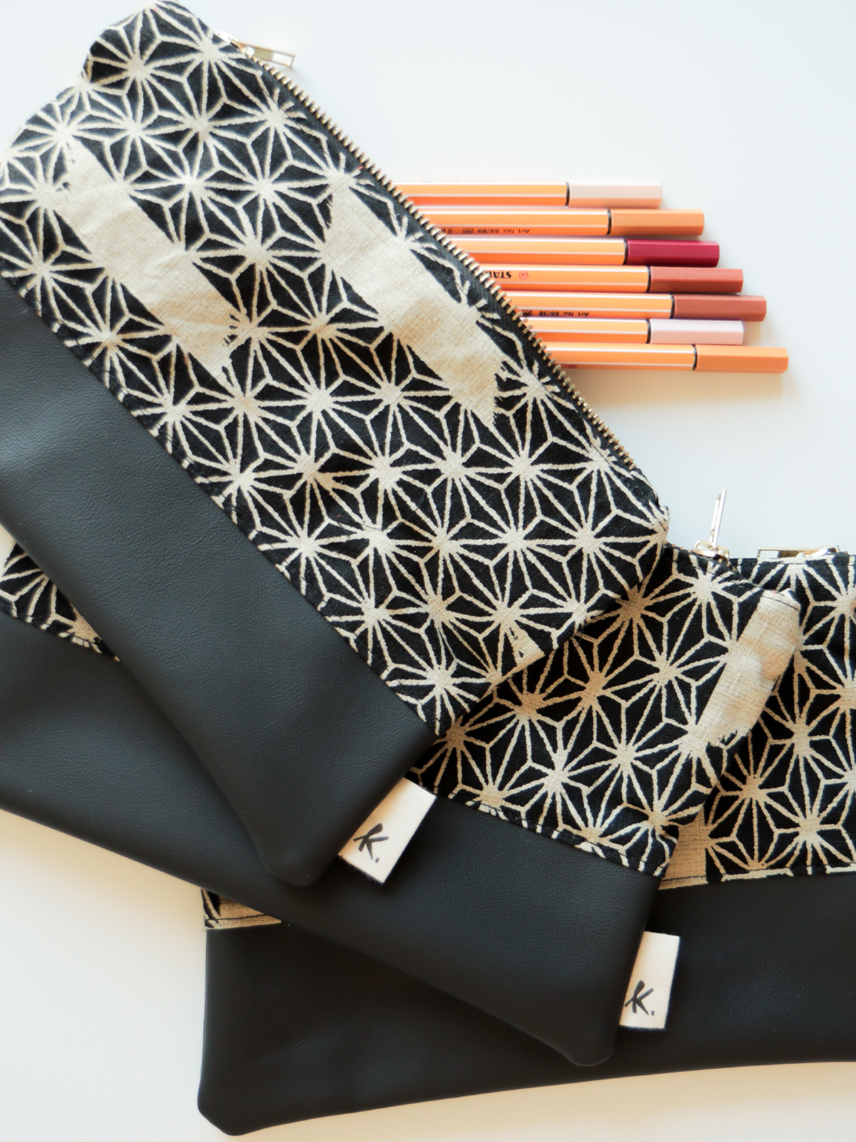 Astuccio pochette con zip in tessuto e pelle – Asanoha
